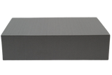 Rectangular Ultrafoam (closed-cell foam) block used for general positioning.