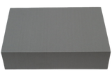 Rectangular Ultrafoam (closed-cell foam) block used for general positioning.