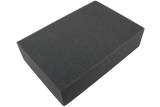 Rectangular open-cell foam block used for general positioning.