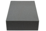 Rectangular open-cell foam block used for general positioning.