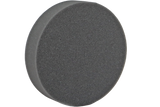 Open-cell foam circular disc which lifts the skull to properly position the spine.