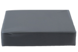 Rectangular clear vinyl-covered open-cell foam block used for general positioning.