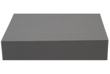 Rectangular Ultrafoam (closed-cell foam) block used for general positioning.