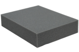 Rectangular open-cell foam block used for general positioning.