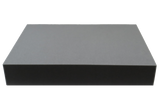 Rectangular open-cell foam block used for general positioning.