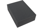 Open-cell foam rectangular block used for general positioning.