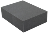Open-cell foam rectangular block used for general positioning.
