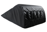 Pillow designed to keep patients comfortable during procedures where the arms must be overhead. Supply pouches are attached to the back to facilitate quick and easy access to tools.
