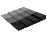 A picture showcasing four Ultrafoam (closed-cell foam) rectangular positioning aids, 4 open-cell foam rectangular positioning aids, and 4 ScanCoat-coated rectangular positioining aids.