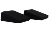 Unique, angled positioning wedges that slide between the bottom of the head holder and the foam insert, elevating the patient’s forehead.