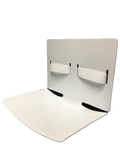 A picture of the Domico Med-Device SteadyPed. A plastic positioning aid with a radiused bottom used to hold a patient's feet at a 90 degree angle during CT scans.