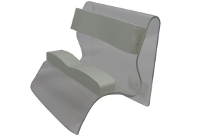 Acrylic head holder with foam pads designed to position a patient's head during diagnostic imaging procedures.